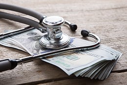 A stethoscope with money