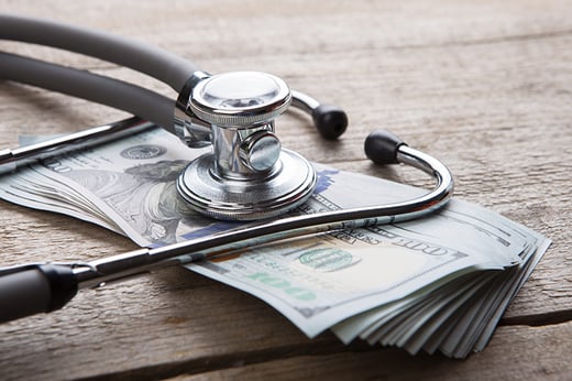A stethoscope and money