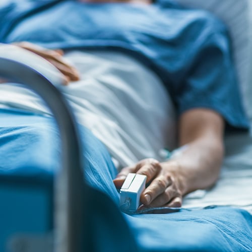 A patient in a hospital bed