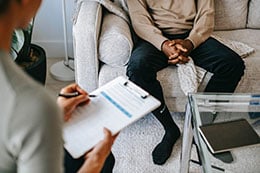A patient speaking with a doctor
